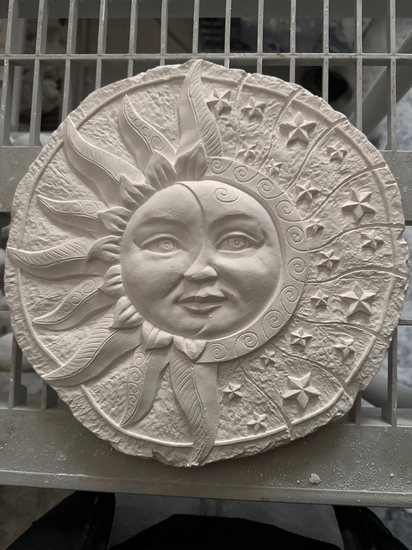 Sun moon stars plaque