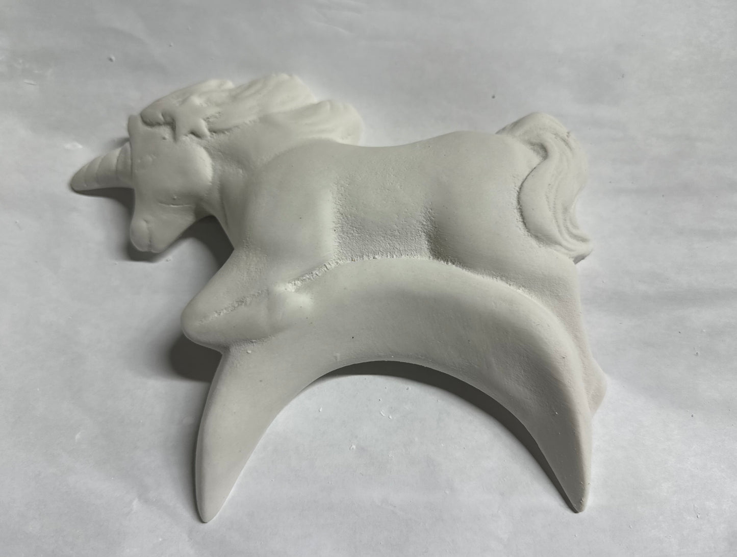 Unicorn over moon